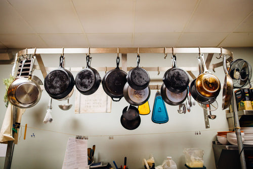 Pans hanging on a kitchen rack